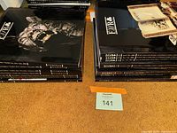 Stack of FMR International Edition magazines with artistic black covers showing photography and series logos.