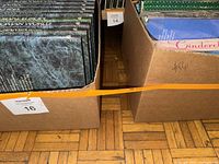 Top view showing the boxed books arranged vertically with a view of titles and edges.