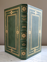Front and back cover of the leather bound book showing gold embossed decorations and title on spine.