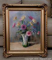 Framed oil painting showing full still life floral bouquet and ornate frame.
