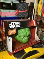 New in box Star Wars Yoda 3D deco light with LED lights in original packaging.
