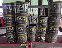 Stacked view of all STAG cans showing sizes and lid presence