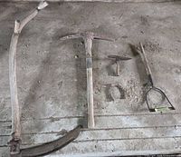All five antique tools laid out