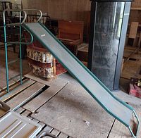 Full side view of slide showing ladder, rails and slide bed