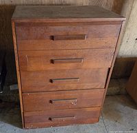front view of dresser showing four drawer fronts