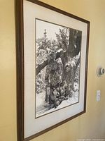 Full view of the framed print hanging on wall