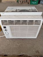 Front view of the Danby window air conditioner showing grille vents and control panel on left side.