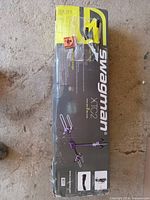 Box front and side showing brand Swagman XT02 model and capacity