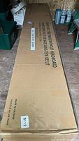 Long cardboard box labeled 'Queen Size Bed Frame Without Headboard', 'Made in Vietnam'