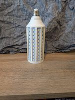 Front view of the new 35W LED light bulb illustrating the multiple LED chip panels and standard screw base.