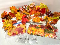 Garland, two bags of mini leaves, loose larger leaves, two suction hooks