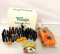 Overview of lot showing fences, pumpkins, candle pack, button pack, original box