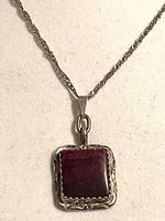Front view of pendant on necklace