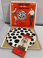 Box lid standing showing product graphics and text