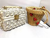 Both wicker handbags side by side showing exterior styles and size comparison