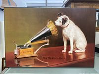 Front view of a wood wall art print showing the classic image of a dog listening to a Victor gramophone with the text "His Master's Voice" at the bottom.