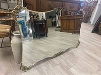Full front view of the mirror leaning on the floor
