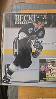 Front cover of Beckett Hockey Magazine May 1992 with Wayne Gretzky in Los Angeles Kings uniform skating on ice.