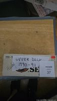 Box labeled 'Upper Deck 1990-91' containing hockey cards from the 1990-91 NHL season