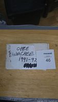 Closed white cardboard box labeled 'OPEE HOCKEY CHEE 1991-92'.