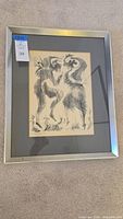 Framed original limited edition lithograph depicting two Flamenco dancers, signed by Julio De Diego, displayed on beige carpet.