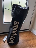 Protective carrying bag cover for the Smart Cart, black fabric with white printing of 'Smart Cart' logo and text.