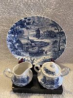 Complete set photo showing sugar bowl, milk jug, and platter with detailed Hayride blue pattern.