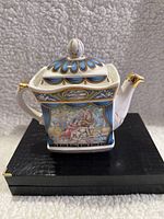 Front view of Sadler A Midsummer Night's Dream square porcelain teapot showing detailed painted scene and decorative trim.