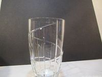 Front side of the clear cut crystal vase with geometric linear design cuts