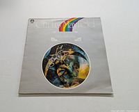 Front cover of Curtis Mayfield LP titled "Got To Find A Way" showing artistic portrait and rainbow stripe.