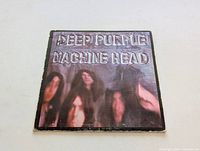 Front of the Deep Purple Machine Head vinyl album cover showing band members and embossed title.
