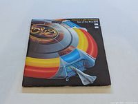 Front cover of Electric Light Orchestra Out of the Blue vinyl LP album showing the spaceship artwork and band title