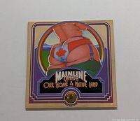 Front cover of Mainline 'Canada Our Home & Native Land' LP showing purple bordered artwork with Canadian-themed cartoon figure.