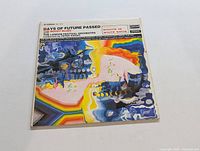 Front cover of 'Days of Future Passed' LP showing colorful abstract artwork with rainbows and shapes