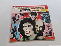 Front cover of The Rocky Horror Picture Show LP with colorful artwork and character images.