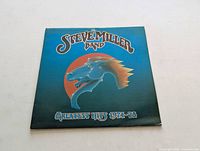 Front of Steve Miller Band Greatest Hits 1974-78 vinyl album sleeve showing blue horse head logo and album title.