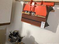 Side and top view of the Craftsman router table showing its construction and surface details.