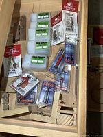 Overview of drawer with router bits and jigs