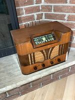 Front view of the Viking wooden radio displaying the dial and speaker grille.