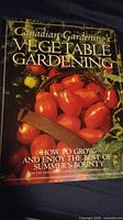 Front cover of the book showing gardening vegetables and title.