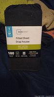 Packaged brand new Mainstays twin fitted sheet, black, soft cotton, 180 thread count.