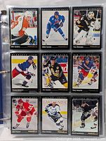 Page of hockey cards featuring players Eric Lindros, Mats Sundin, Tom Barrasso, Tomas Sandstrom, Joe Mullen, Tony Amonte, Bob Probert, Chris Kontos, and Geoff Sanderson in excellent condition.