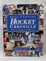 Front cover of '20th Century Hockey Chronicle' hardcover book with multiple hockey player images and title text.