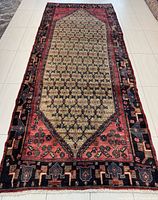 Full view of the handmade Hamadan Persian rug laid flat showing overall design and size.