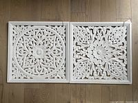 Overall view of both carved panels