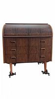 Front view showing roll-top closed, six lower drawers, tapered legs with casters