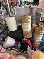 Basket with assorted candles, votives, beeswax candles, zen fountain, salt blocks, and natural decorative stones