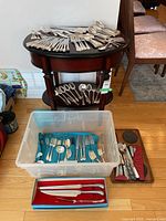 Full lot on table, plastic bin and knife case