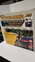 Side angle photo of the Voyager III B rear mounted bicycle rack box showing product image and details