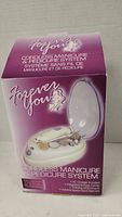 Front and side view of the Forever You cordless manicure and pedicure system packaging showing product image and features.